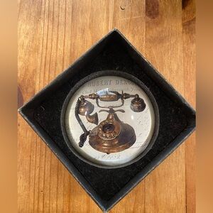 Vintage dome glass paperweight with antique telephone design (ABA)